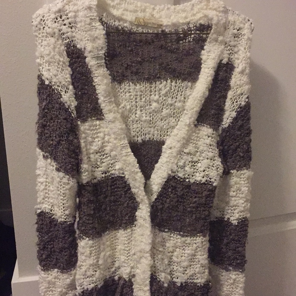 Light brown and white cardigan.
